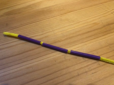 Making Geometric Bubble Wands - slide the straw pieces onto the pipe cleaner leaving ends free