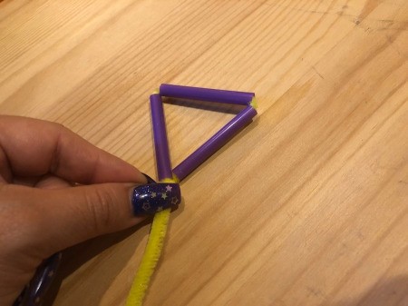 Making Geometric Bubble Wands - shape the straw pieces into a triangle and twist the ends of the pipe cleaner together
