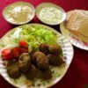 Falafel on plate with sauces & crackers