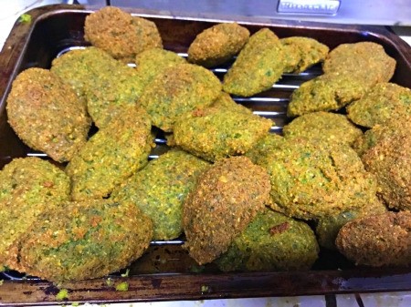 Falafel draining on rack