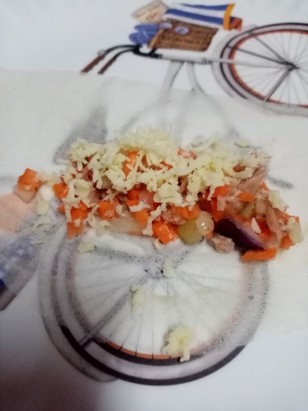 adding cheese to wrapper
