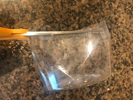 Repupose Mouthwash Container into a Planter - use scissors for final trim