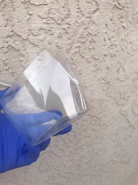 Repupose Mouthwash Container into a Planter - showing the shape of the bottle's lower portion