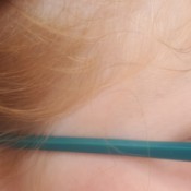 Getting Rid of Head Lice and Nits - possible nit in child's hair