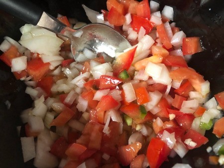 mixing chopped vegetables