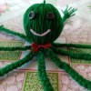 Mr. Octopus Made of Yarn - closeup of gren yarn octopus