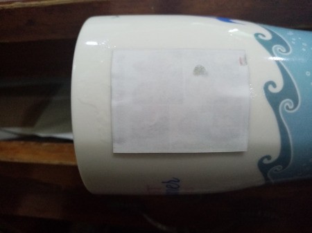 Photo Transfer Using White Glue - stick the print down on the mug image side down