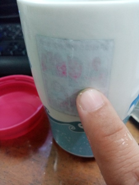 Photo Transfer Using White Glue - when dry rub with your fingers dipped in water, don't get too wet