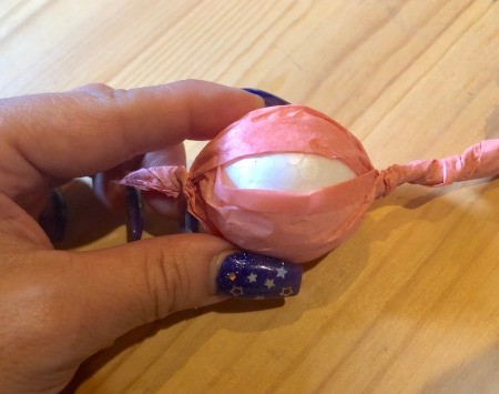 Making Tissue Paper Puffy Flowers - twist the other end to look like wrapped candy