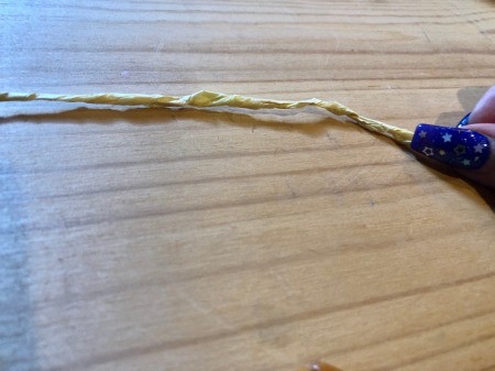 Making Tissue Paper Puffy Flowers - twist a piece of your pistil paper tightly