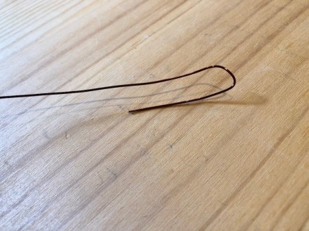 Making Tissue Paper Puffy Flowers - ben the end of a piece of wire into a hook