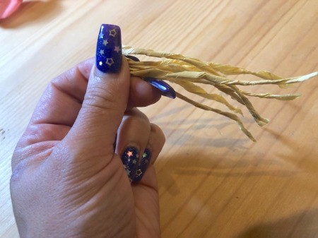 Making Tissue Paper Puffy Flowers - fold the pistils in half