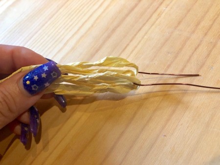 Making Tissue Paper Puffy Flowers - hook them onto the wire