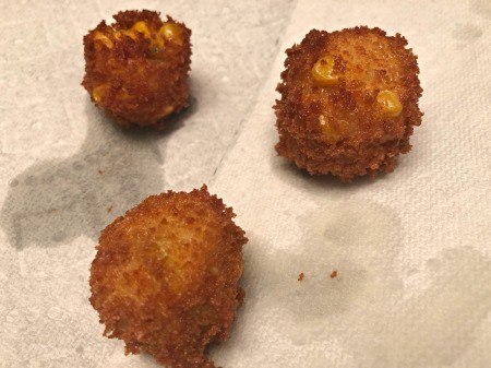 Crispy Grits Fritters on paper towel