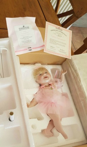 Value of Ashton Drake Dolls - doll in Stryofoam packing material with certificates