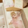 Value of Ashton Drake Dolls - doll in Stryofoam packing material with certificates