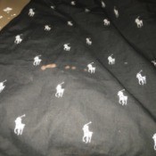 Bleach Stains on Pajamas - brown bleach marks on black pajamas
