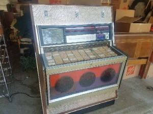 Value of a 1969 Rowe AMI MM3 Jukebox - jukebox in garage