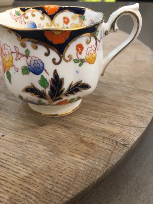 Value of Bognor Prince Albert China - white tea cup with gold trim and a floral pattern