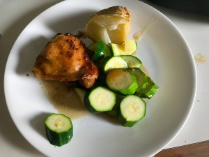 Chicken Thigh with zucchini on plate