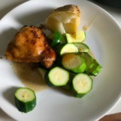 Chicken Thigh with zucchini on plate