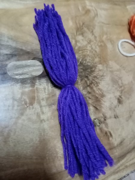 Yarn Bird - cut the loop and tie together at the center