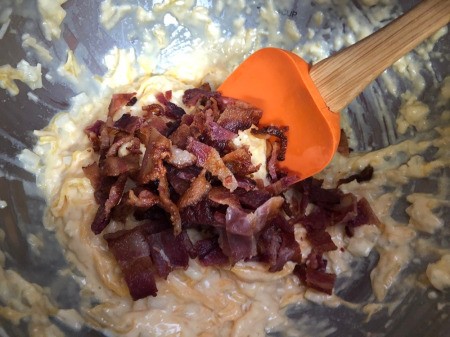 adding crumbled bacon to batter