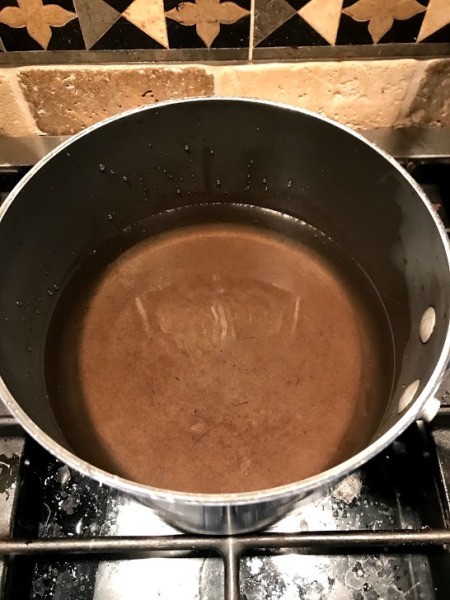 Growing Borax Crystals - pan of water on stove