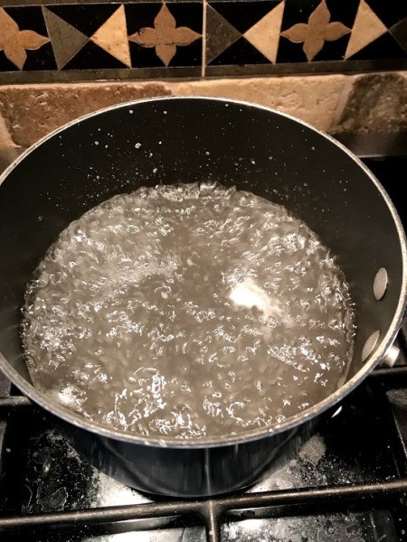 Growing Borax Crystals - boiling water with dissolved borax stirred in