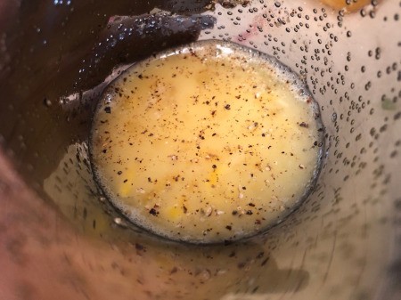 mixing yolks & whites together with seasoning