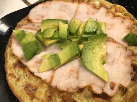 adding fillings to Omelette Taco