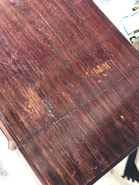 The top of a vintage table.