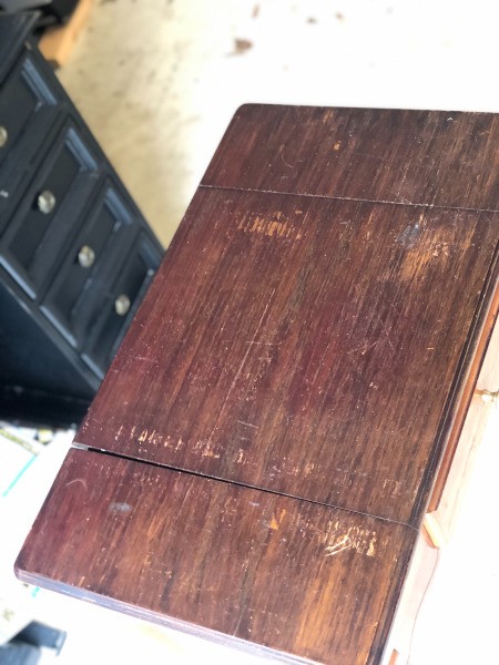 The top of a vintage table.