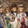 Value of Ashley Belle Porcelain Dolls- 5 dolls in fancy clothing