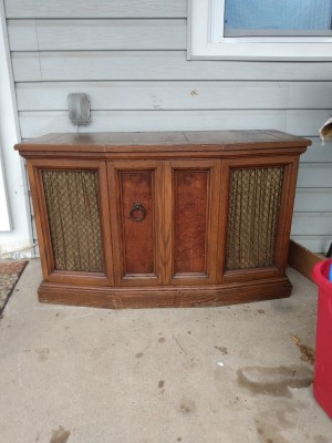 Value of Sylvania Console Stereo System - stereo sitting on a porch