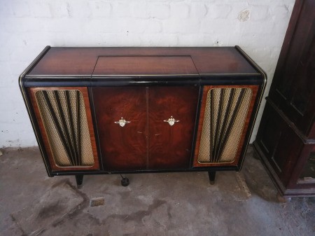 A vintage console stereo system.