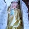 Value of an Ashton Drake -
Porcelain Doll  - baby doll in a box