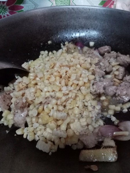 Corn added to pan