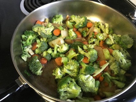 broccoli flowers added to pan