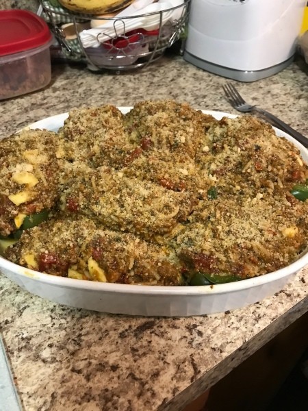 The filled zucchini and pepper halves.