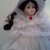 Value of a Seymour Mann Scarlet O'Hara Doll  - Scarlet wearing a white dress and and matching hat