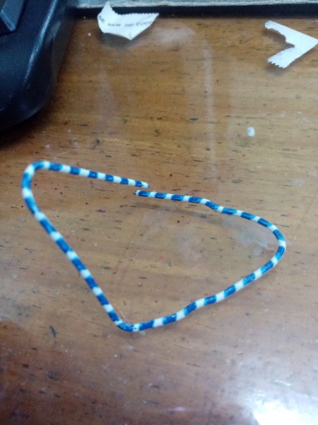 Making a Paper Clip Phone Stand - pull ends together to make this shape