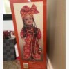 Value of a Limited Edition Ayana Porcelain Doll - doll in a box, wearing a long dress and matching head dress