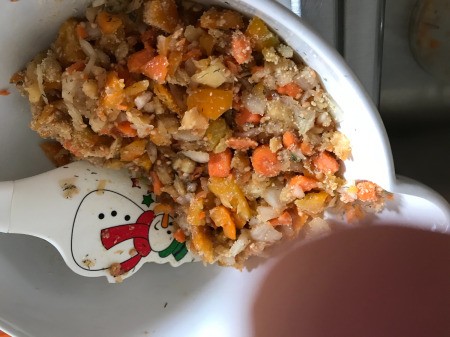mixing bread crumbs in bowl
