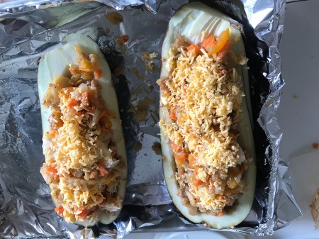 Eggplant halves with cheese on top