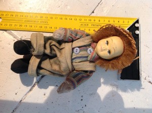 Identifying a French Doll - doll lying next to a ruler