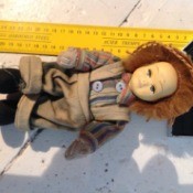 Identifying a French Doll - doll lying next to a ruler