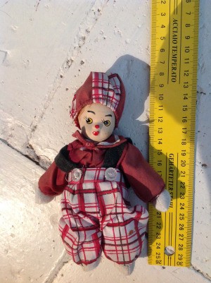 Identifying a French Porcelain Doll - little clown doll wearing red shirt and plaid pants and matching hat