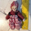 Identifying a French Porcelain Doll - little clown doll wearing red shirt and plaid pants and matching hat