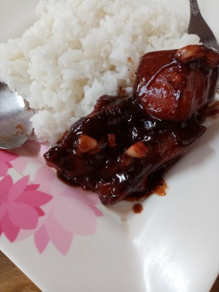 Pork Belly and Ribs in Barbecue Sauce on plate with rice